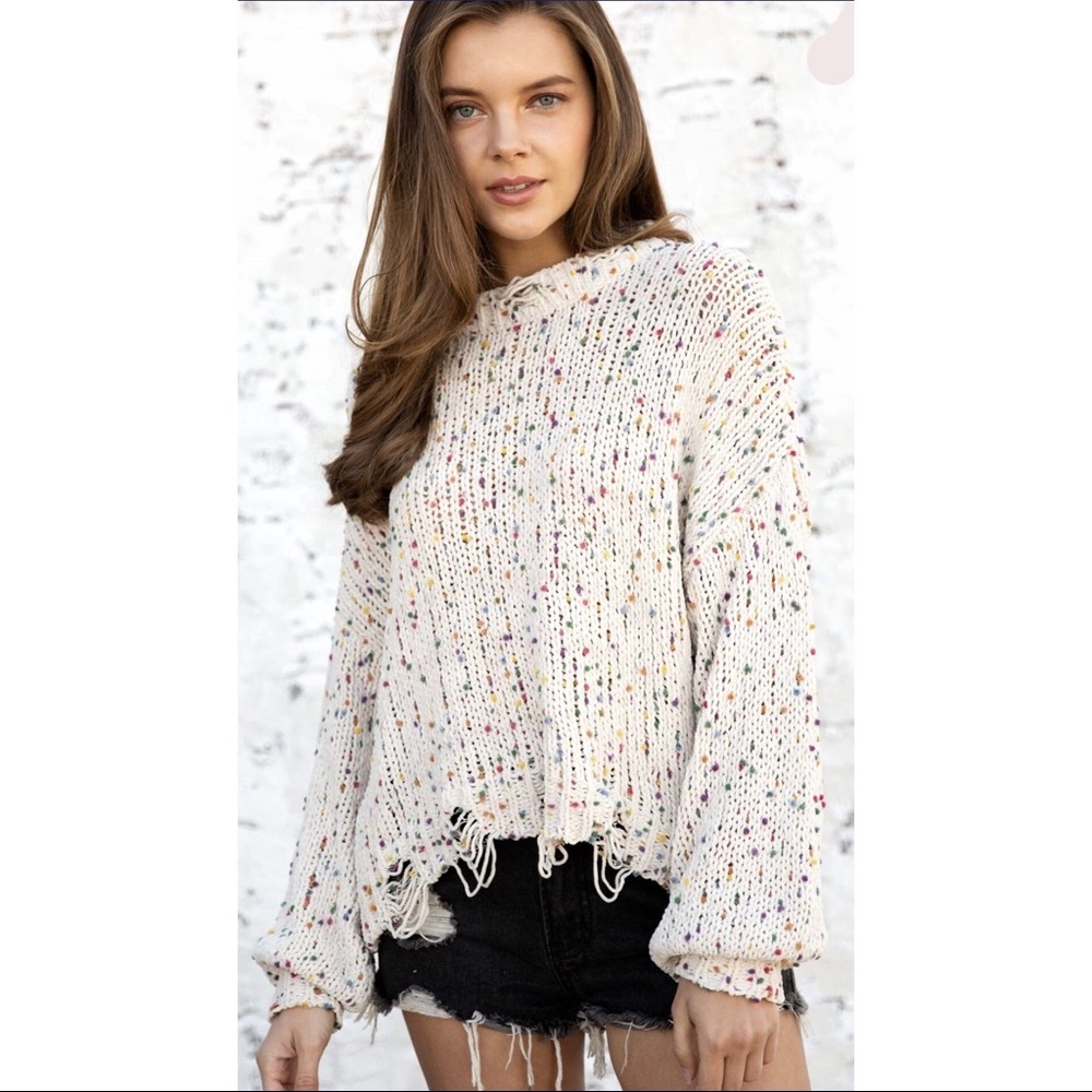 Knitted sweater with distressed Hem details - Picture 2 of 8